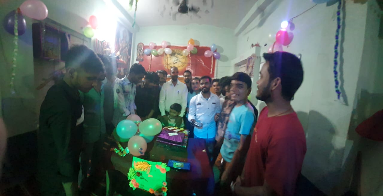 Academy celebration with cake and students